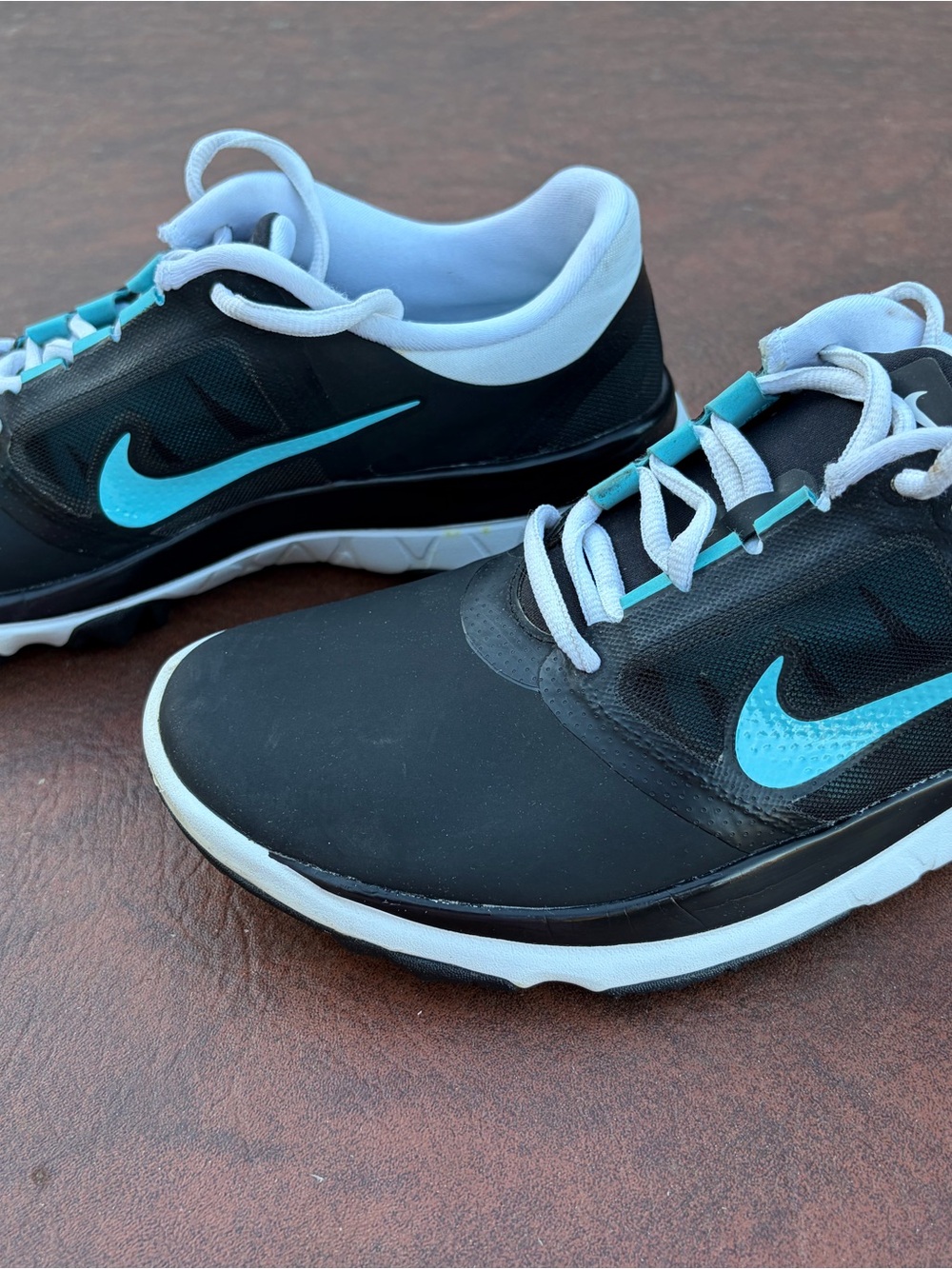 Nike Golf Shoes with Teal Accents